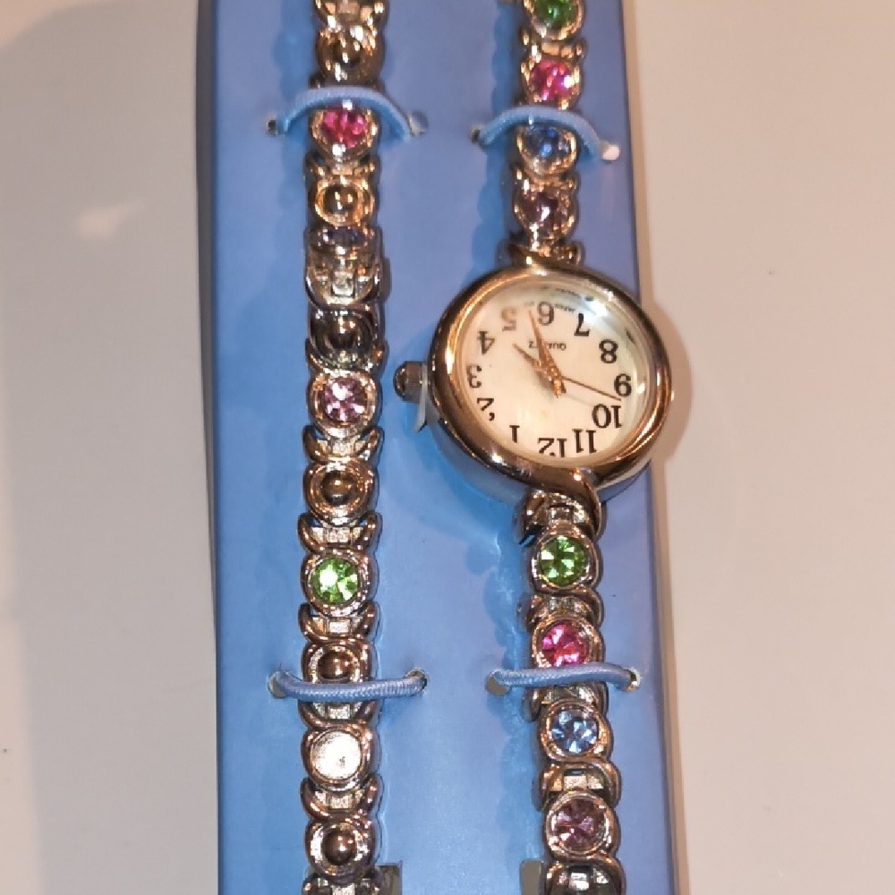 Avon Silver Watch with Pink and Green Accents